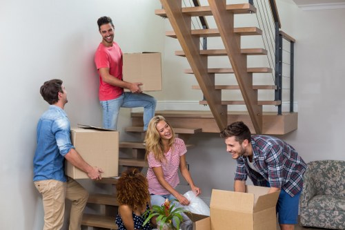 Removal team loading household furniture for storage in Richmond upon Thames