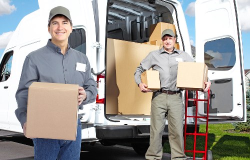 Careful wrapping and collection of household furniture for storage
